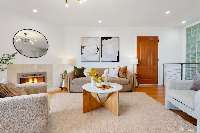 372 Baltimore Way, San Francisco, CA 94112 - living room with recessed lighting, wood finished floors, and a high end fireplace