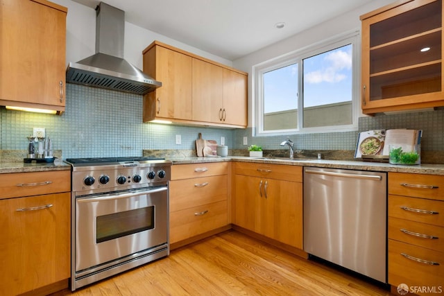 372 Baltimore Way, San Francisco, CA 94112 - kitchen featuring stainless steel appliances, wall chimney exhaust hood, light wood-style floors, tasteful backsplash, and glass insert cabinets