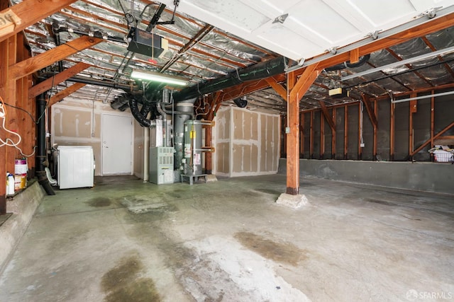 372 Baltimore Way, San Francisco, CA 94112 - garage featuring washer / dryer, water heater, a garage door opener, and heating unit