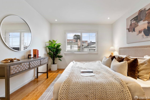 372 Baltimore Way, San Francisco, CA 94112 - bedroom featuring wood finished floors, multiple windows, and recessed lighting