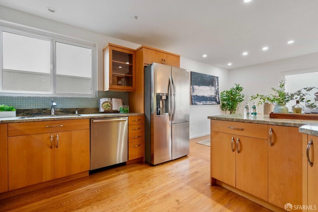 372 Baltimore Way, San Francisco, CA 94112 - kitchen featuring stainless steel appliances, light wood-style floors, tasteful backsplash, glass insert cabinets, and recessed lighting