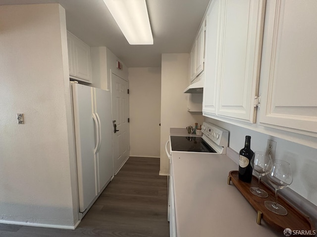 450 Carl St, San Francisco, CA 94117 - kitchen featuring white appliances, under cabinet range hood, white cabinetry, dark wood-style floors, and light countertops