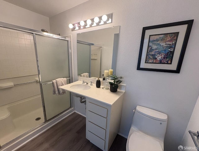 450 Carl St, San Francisco, CA 94117 - bathroom with a stall shower, wood finished floors, and vanity