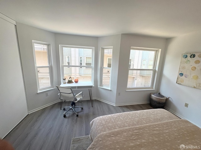 450 Carl St, San Francisco, CA 94117 - bedroom featuring wood finished floors and baseboards