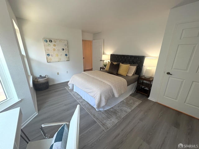 450 Carl St, San Francisco, CA 94117 - bedroom featuring wood finished floors and baseboards