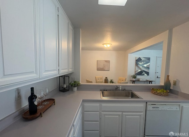 450 Carl St, San Francisco, CA 94117 - kitchen with dishwasher, white cabinets, and light countertops