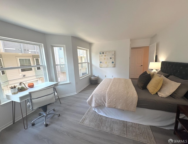 450 Carl St, San Francisco, CA 94117 - bedroom featuring wood finished floors and baseboards