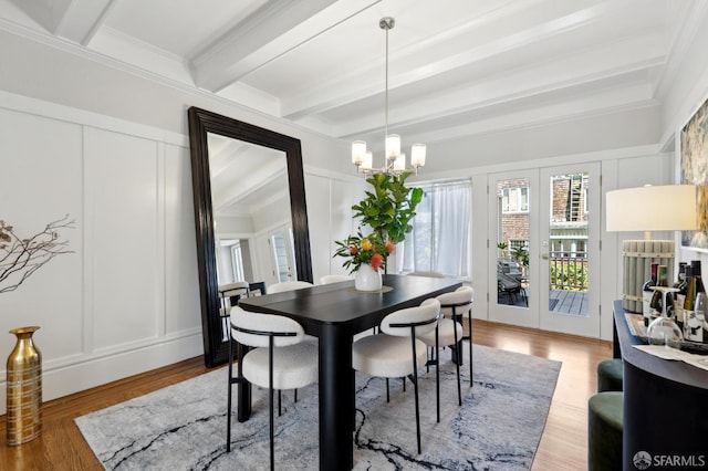 510 11th Ave, San Francisco, CA 94118 - dining space with a decorative wall, a chandelier, beam ceiling, wood finished floors, and ornamental molding