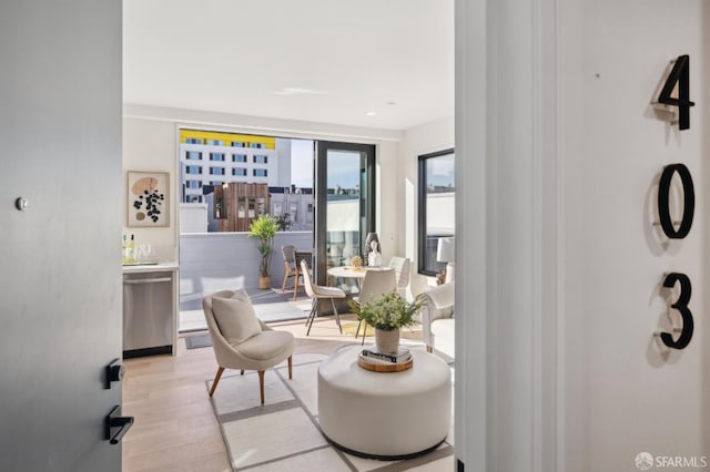 living area featuring light wood-type flooring