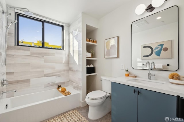 full bathroom featuring tile patterned flooring, vanity, toilet, and tiled shower / bath