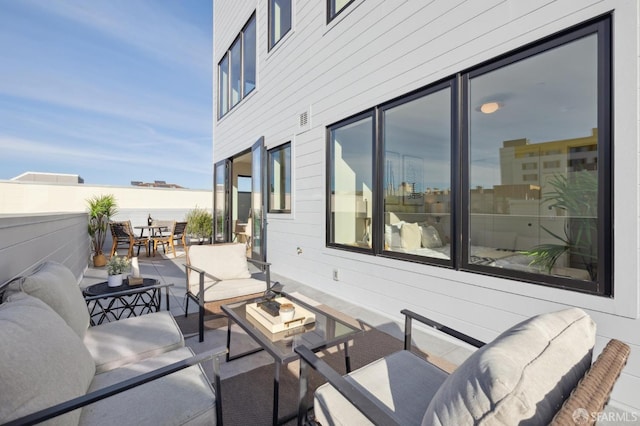 view of patio / terrace featuring an outdoor living space