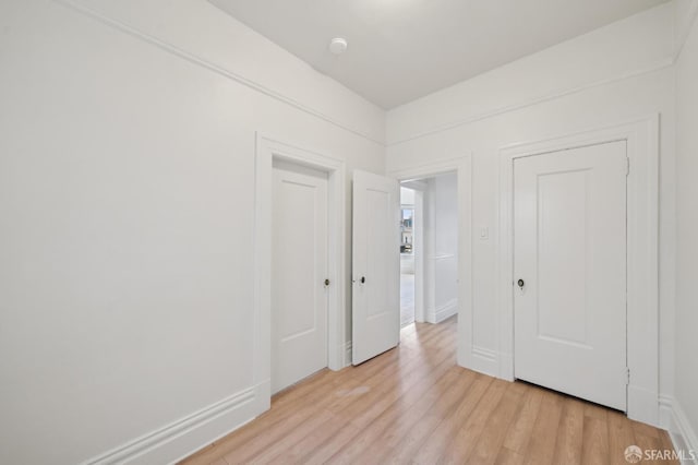 968-970 Broadway, San Francisco, CA 94133 - unfurnished bedroom with light wood-type flooring and a closet