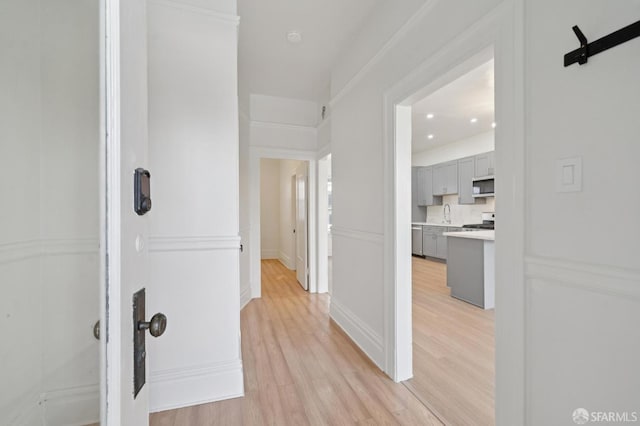 968-970 Broadway, San Francisco, CA 94133 - hall with light wood-style floors and recessed lighting