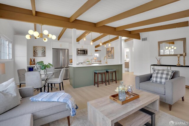 4330 Jana Vista Rd, El Sobrante, CA 94803 - living room featuring a chandelier and light wood-type flooring