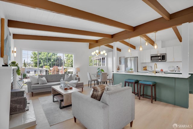 4330 Jana Vista Rd, El Sobrante, CA 94803 - living room featuring a chandelier and light wood-style floors