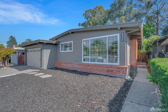 4330 Jana Vista Rd, El Sobrante, CA 94803 - single story home with an attached garage, brick siding, and stucco siding