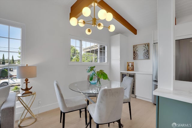 4330 Jana Vista Rd, El Sobrante, CA 94803 - dining room featuring beverage cooler, a chandelier, and light wood-type flooring