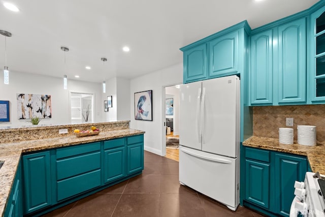 1871 Alemany Blvd, San Francisco, CA 94112 - kitchen featuring freestanding refrigerator, recessed lighting, range, dark tile patterned floors, and pendant lighting