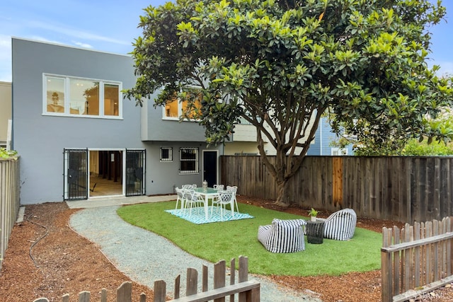 1871 Alemany Blvd, San Francisco, CA 94112 - back of house featuring stucco siding and a patio area