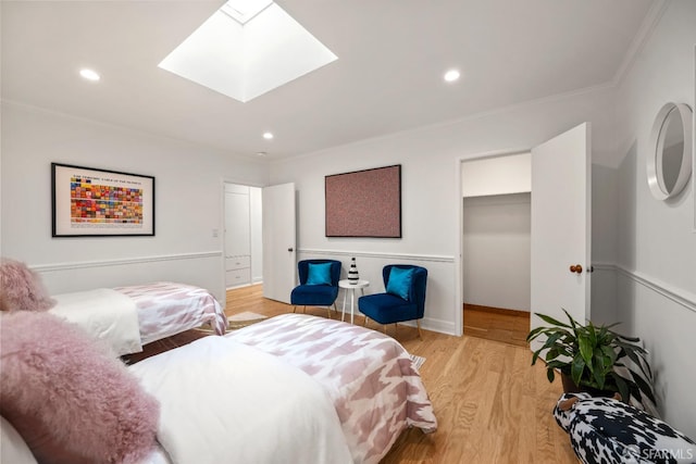 1871 Alemany Blvd, San Francisco, CA 94112 - bedroom with light wood finished floors, ornamental molding, a skylight, recessed lighting, and a closet