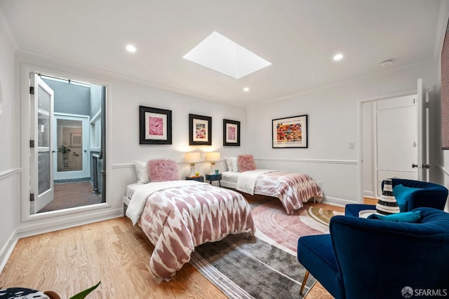 1871 Alemany Blvd, San Francisco, CA 94112 - bedroom featuring a skylight, wood finished floors, crown molding, recessed lighting, and baseboards