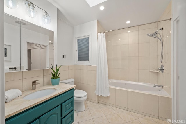1871 Alemany Blvd, San Francisco, CA 94112 - bathroom with tile patterned flooring, tiled shower / bath combo, tile walls, vanity, and a skylight