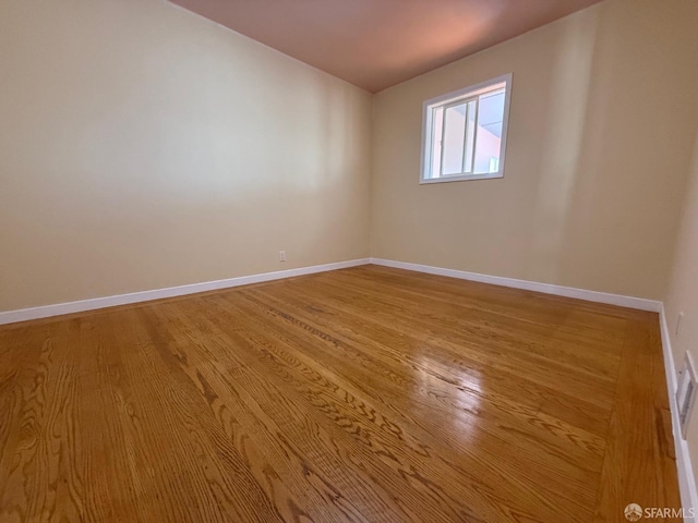 unfurnished room featuring light wood-type flooring