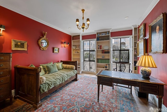 office featuring an inviting chandelier, crown molding, wood-type flooring, and built in shelves