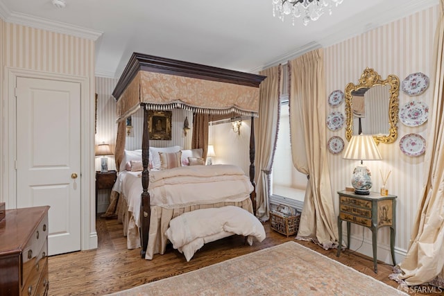 bedroom with wood-type flooring and crown molding