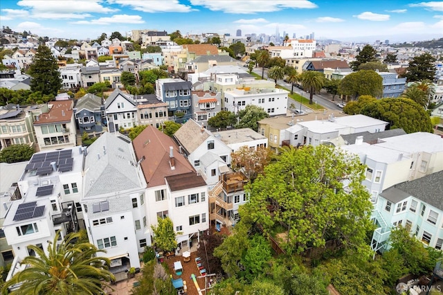 birds eye view of property with a residential view