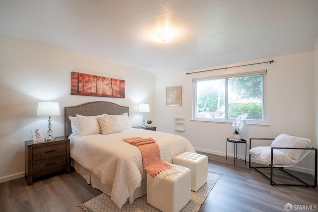 bedroom with hardwood / wood-style floors