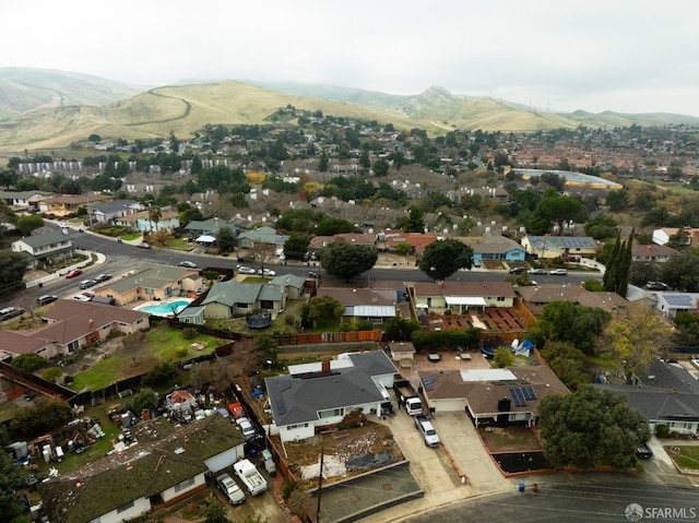 drone / aerial view featuring a mountain view