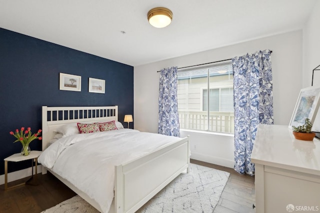 bedroom featuring light wood-type flooring