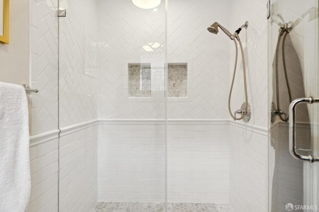 bathroom featuring an enclosed shower