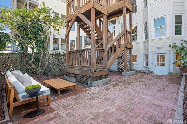 view of patio / terrace with stairs and outdoor lounge area