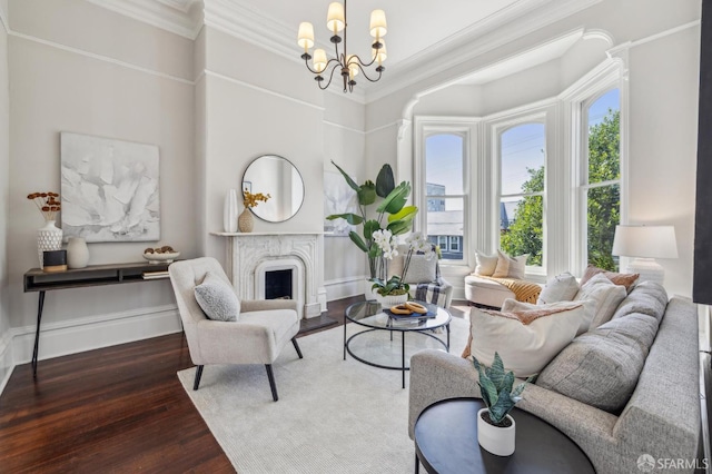 436 Page St, San Francisco, CA 94102 - living room with crown molding, a chandelier, a fireplace, wood finished floors, and baseboards
