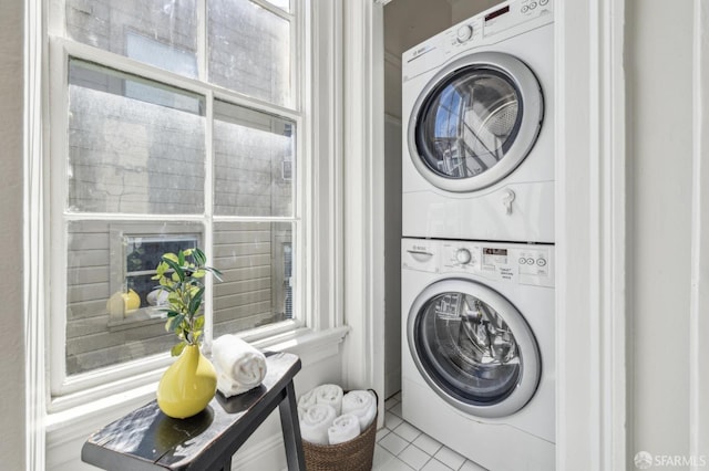 436 Page St, San Francisco, CA 94102 - clothes washing area featuring estacked washer and dryer and tile patterned floors