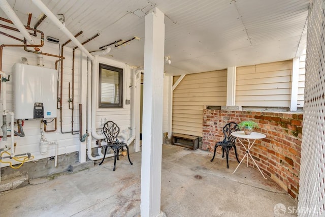 view of patio featuring water heater