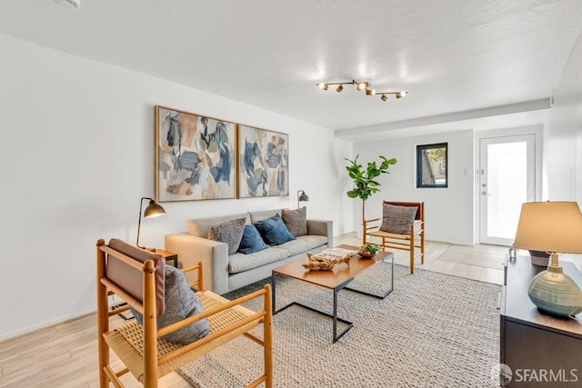 living area with light wood-style floors