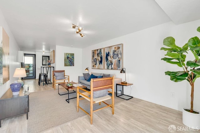 living area with wood finished floors