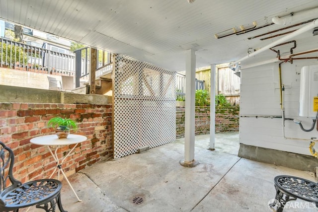 view of patio / terrace featuring water heater