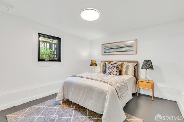 bedroom featuring baseboards