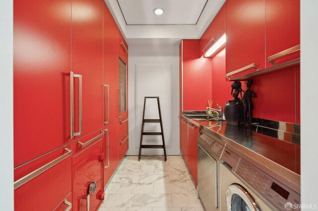 washroom with laundry area, a sink, and marble finish floor