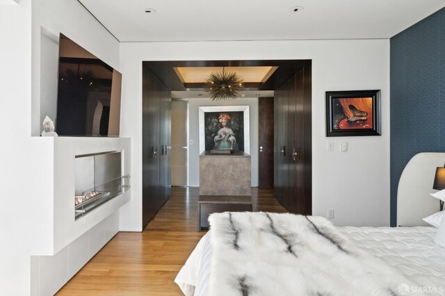 bedroom with light wood-style floors