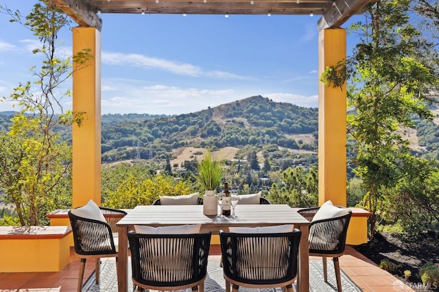 view of patio / terrace with a mountain view