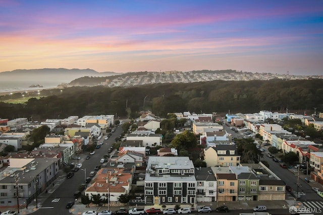 aerial view at dusk with a mountain view