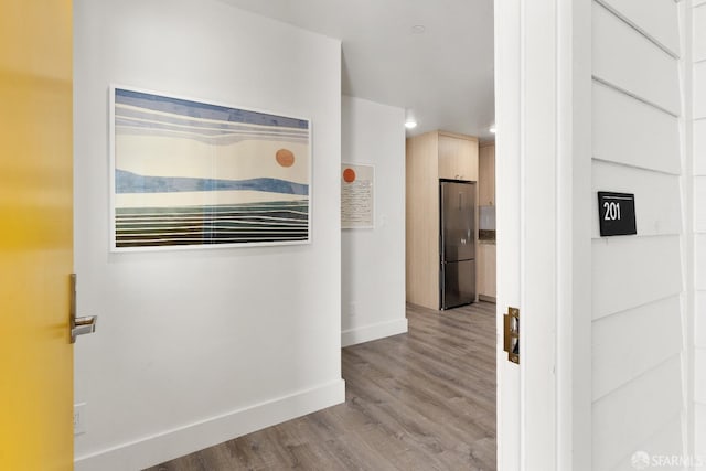 hallway featuring light hardwood / wood-style floors