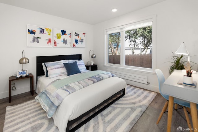 bedroom featuring hardwood / wood-style flooring