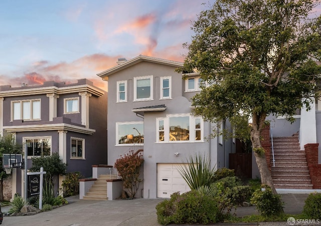 view of front of property featuring a garage