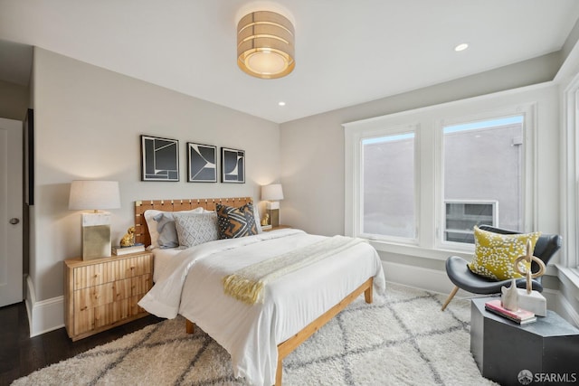 bedroom with hardwood / wood-style floors